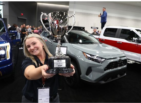 A very proud woman for her trophy